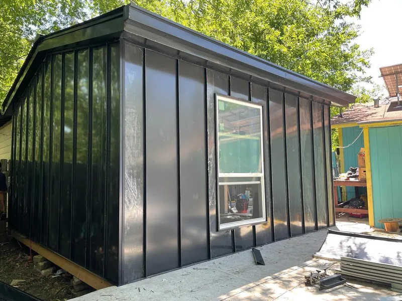 Black standing seam metal wall panels for Metal Roof Installation in Camillus